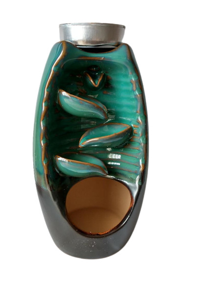Candela ceramica verde in forma de vaza